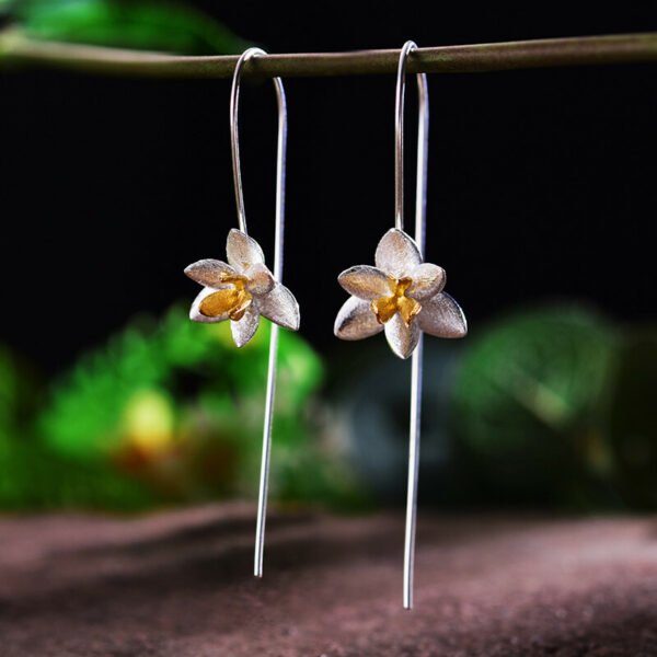 Imagem do Brinco Orquídea em Prata 925 e Ouro 18k | ARISCA
