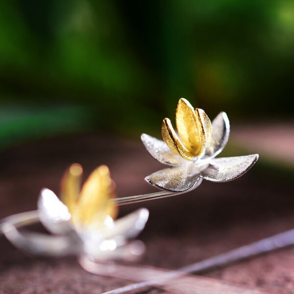 Imagem do Brinco Orquídea em Prata 925 e Ouro 18k | ARISCA