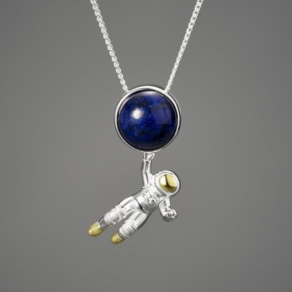 Imagem do Pingente Astronauta em Prata 925 e Ouro 18k | ARISCA